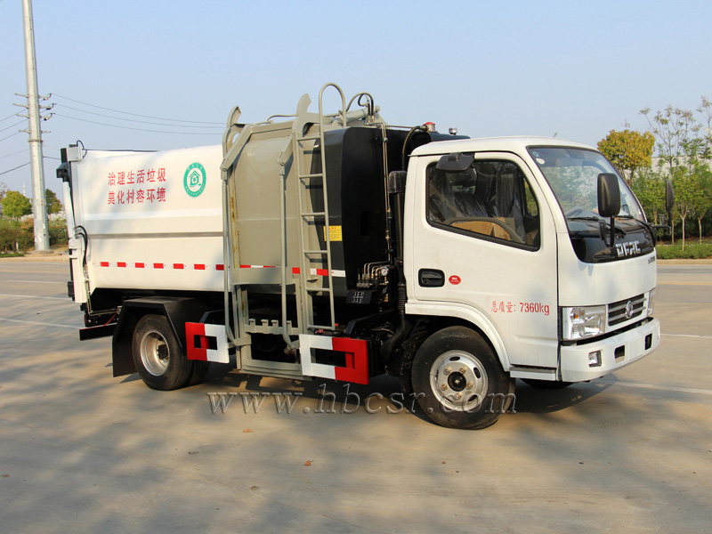 东风小多利卡7方侧装挂桶压缩垃圾车